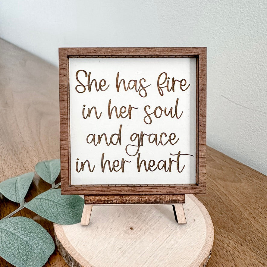 She has fire in her soul and grace in her heart