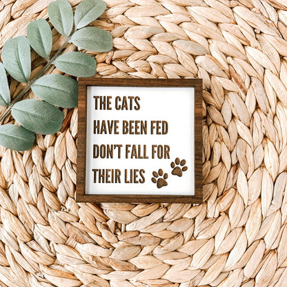 The cats have been fed