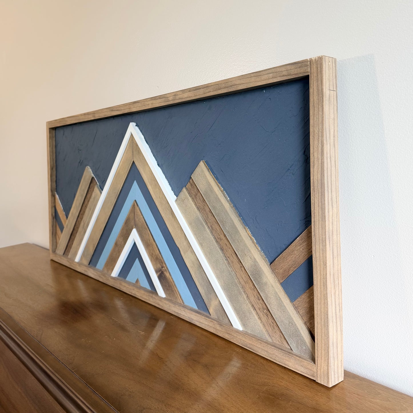 Modern rustic mountain wall decor made from reclaimed wood, designed as a statement wall piece