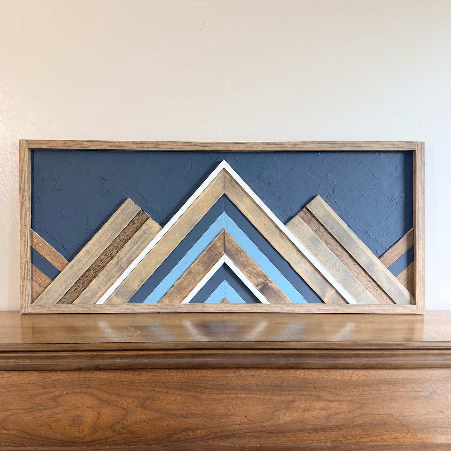 Handcrafted mountain wood wall art made from reclaimed wood in a modern rustic style