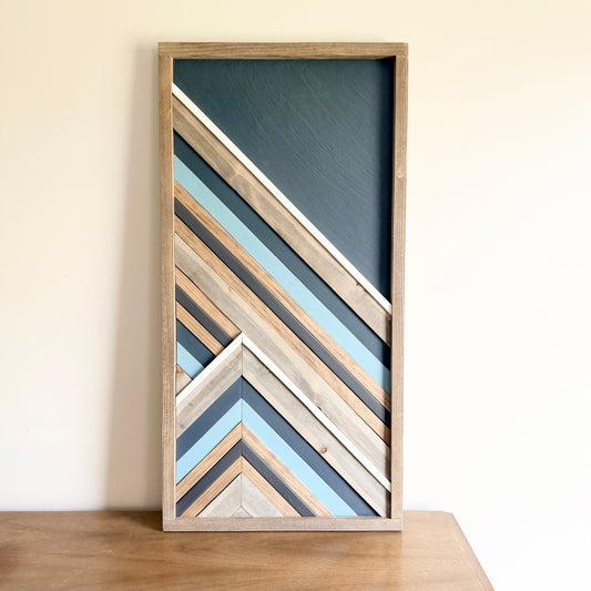 Handcrafted geometric wood wall art made from reclaimed wood in a modern rustic design