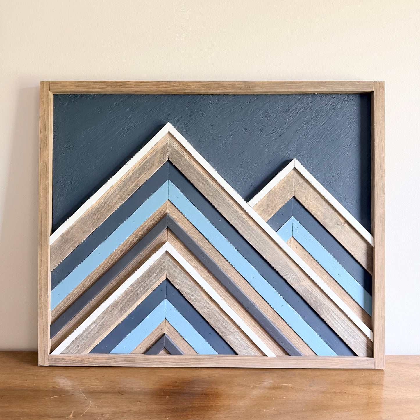 Reclaimed wood wall decor with layered wood mosaic design