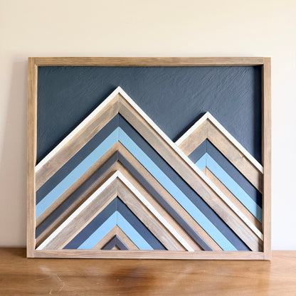 Reclaimed wood wall decor with layered wood mosaic design