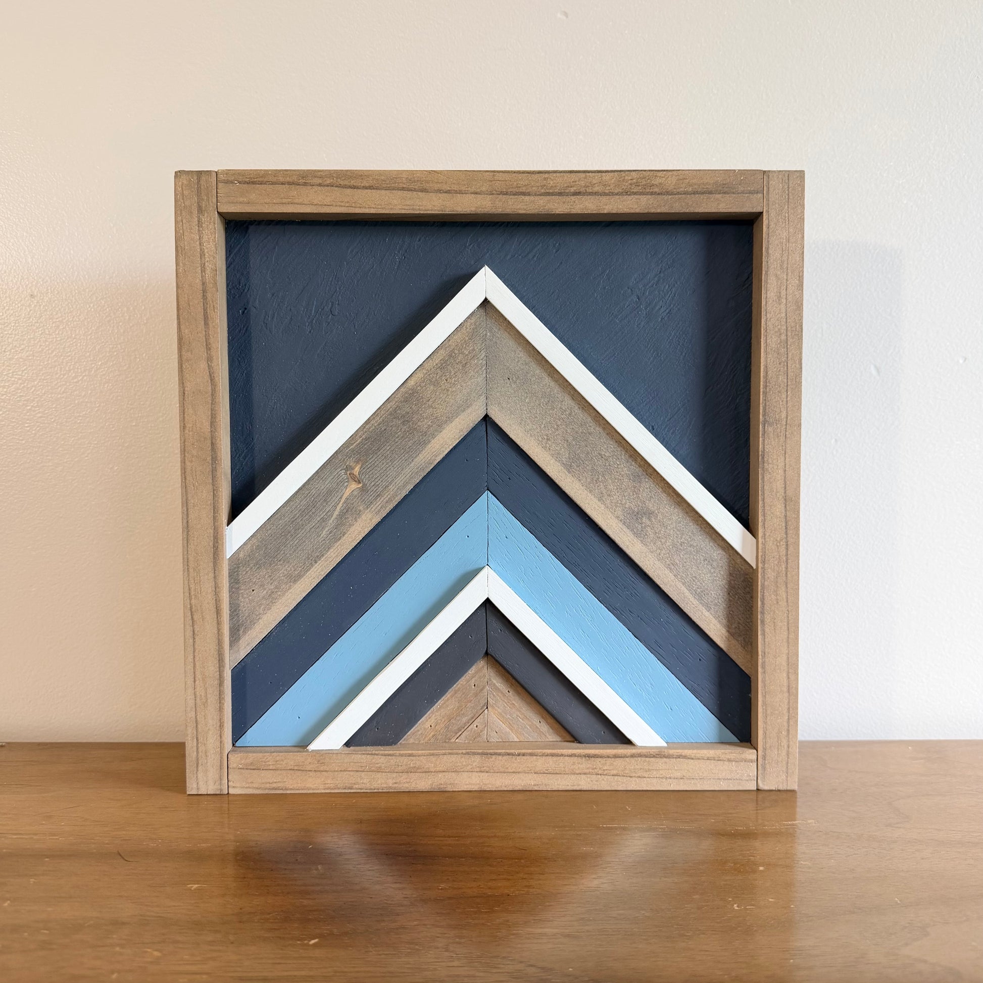 small geometric wood wall hanging made by hand