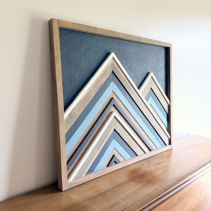 Geometric wood wall hanging made from reclaimed and natural wood