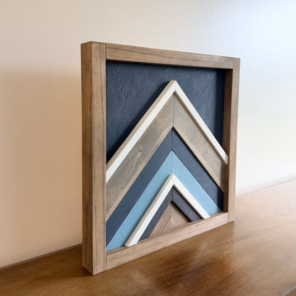 small wood wall art made from reclaimed wood with geometric mountain design